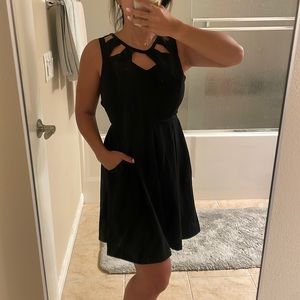 Black a-line cutout dress with pockets. Small.